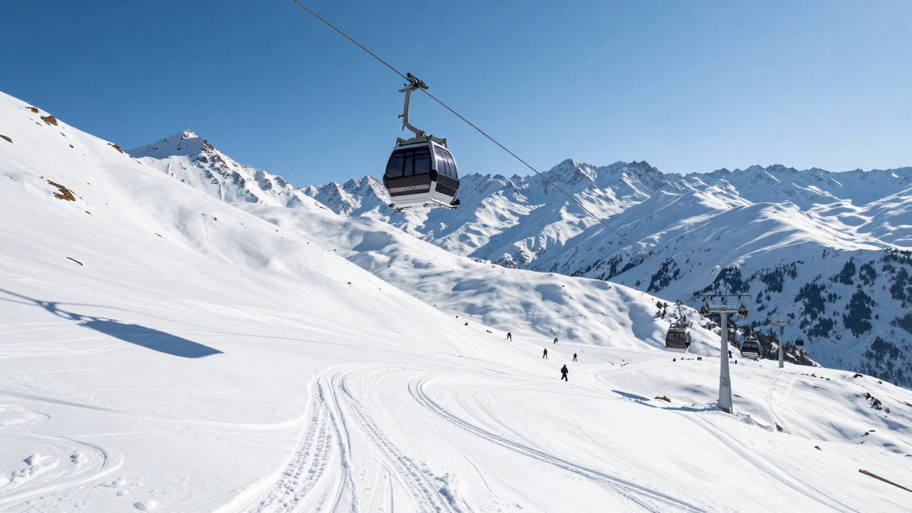 Gondola cable car overlooking snowy ski slopes and mountains in Gulmarg