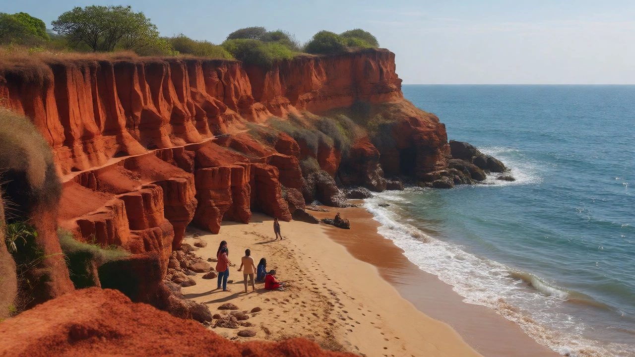 View of Varkala Beach from red cliffs with clean shoreline and calm sea